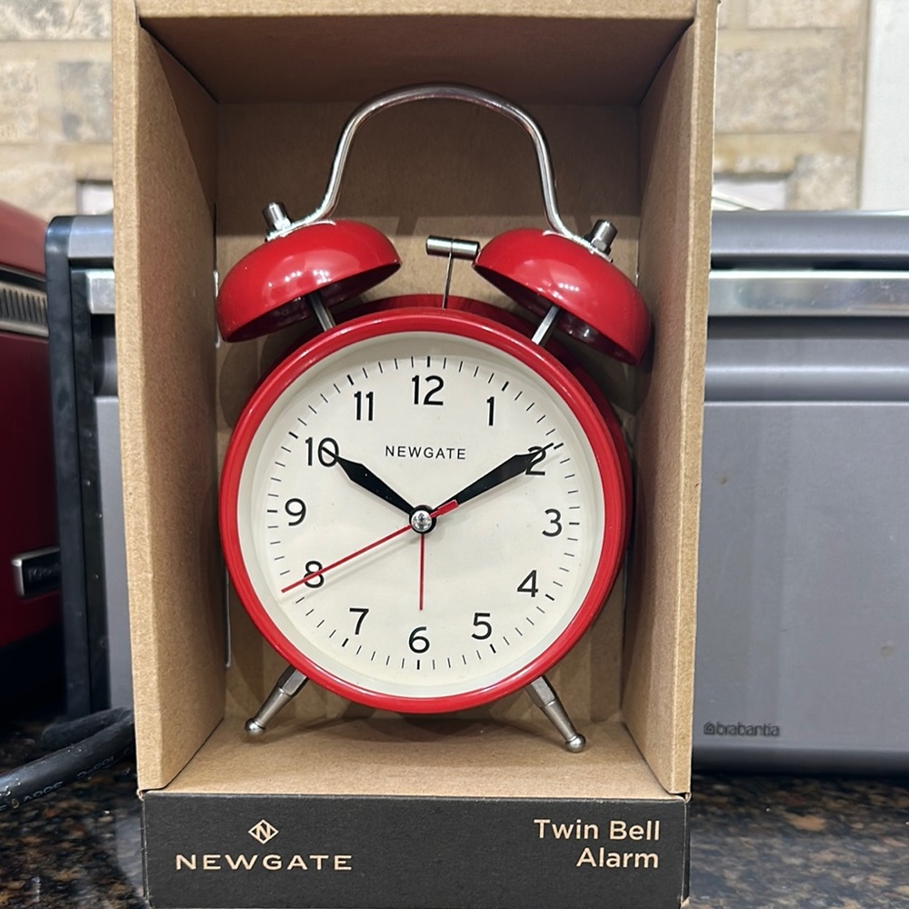 Red and White Vintage Wall Clock. New in box.
